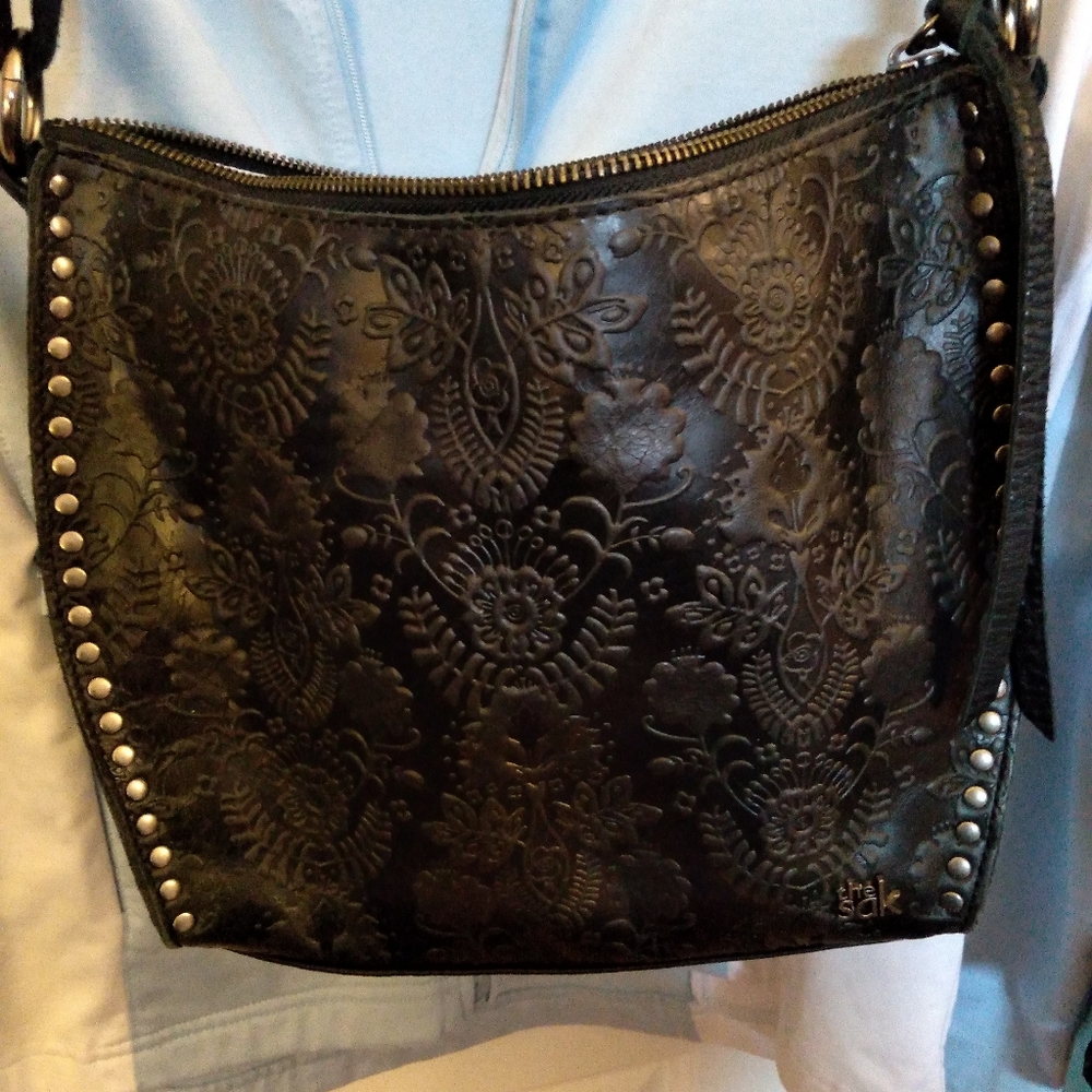 Studded leather messenger bag